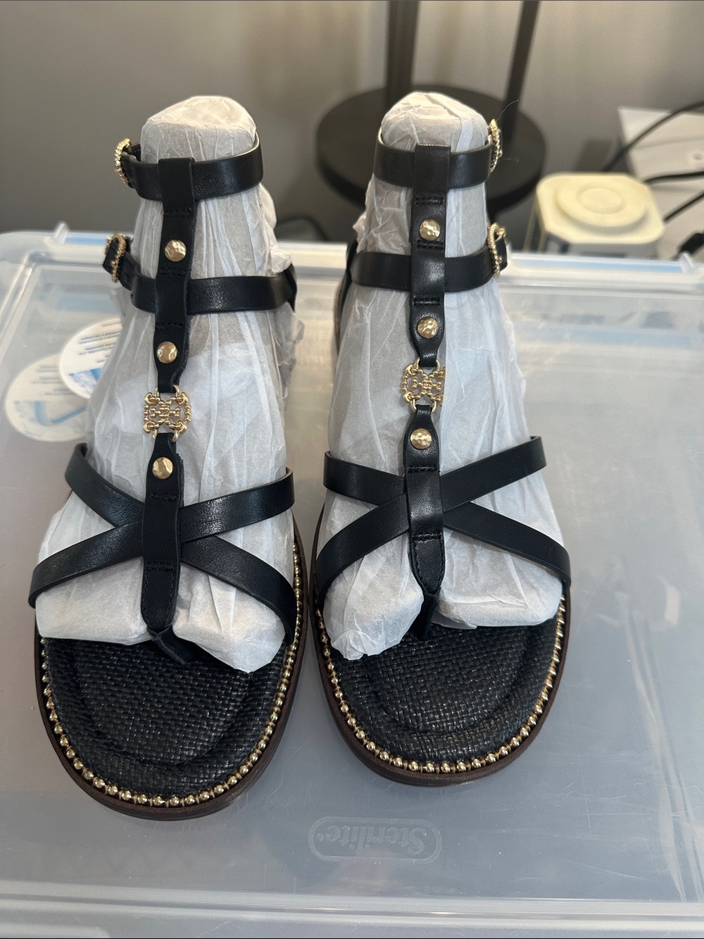 Women's Black Strappy Sandals with Gold Stud & Emblem Detail